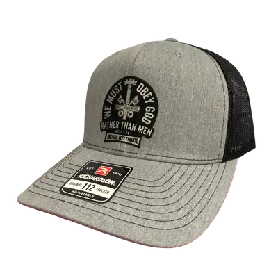 We Must Obey God Trucker Hat