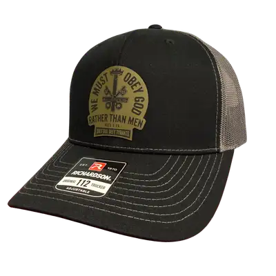 We Must Obey God Trucker Hat
